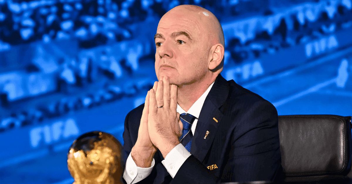 UEFA and FIFA flags at a football governance meeting